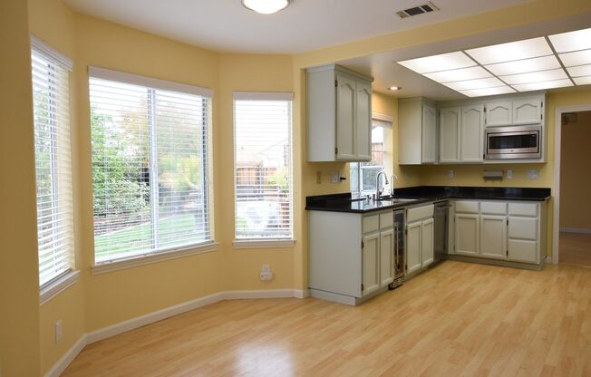 Beautiful 4 Bedroom 3 Bath Evergreen Home with Stunning Spacious Backyard!