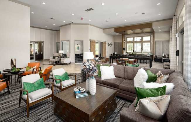 Clubhouse interior  with seating  areas at Carmel Vista, McDonough, 30253
