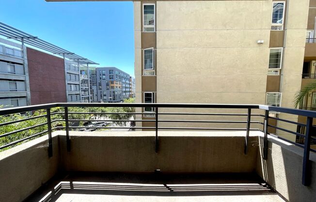 Lovely East Village Studio - Corner Unit, W/D, A/C & Balcony Views!