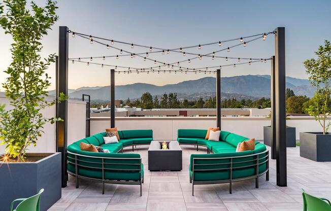 Embrace evenings under the stars at Modera Pomona! Our rooftop deck, adorned with string lights and featuring a welcoming firepit, creates the perfect ambiance for relaxation and socializing. Enjoy a magical setting where comfort meets charm and make every night special in sunny California.