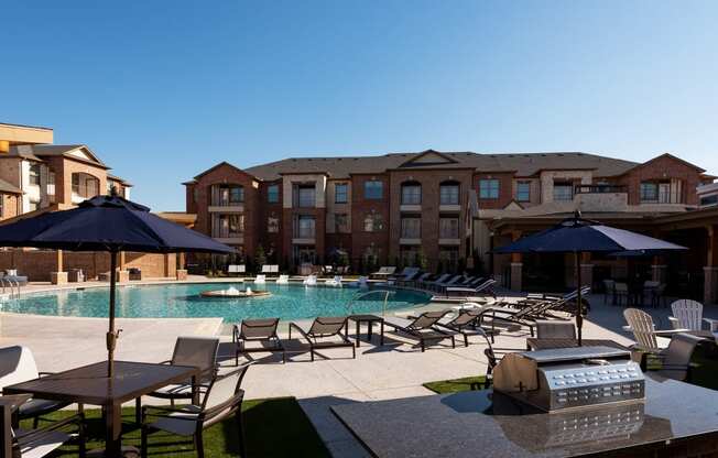Relaxing Pool Area With Sundeck at Windsor Castle Hills, Carrollton, TX, 75010