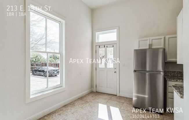 213 E 13 ST