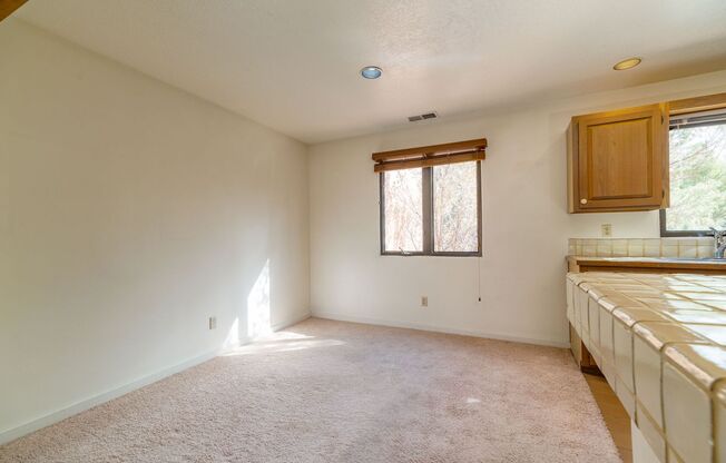 Two Story Condo Just off Old Taos Highway Available Now!