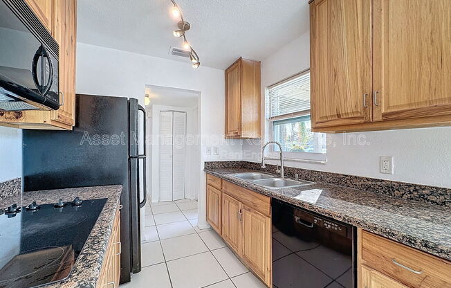 9893 47 AVE N