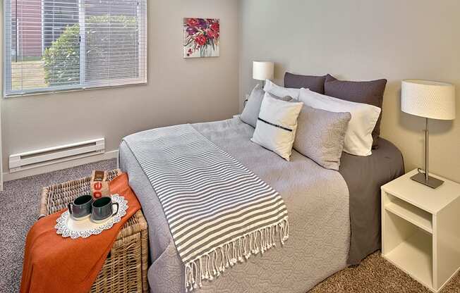 the preserve at ballantyne commons apartments bedroom with bed at Quartz Creek, Mountlake Terrace, Washington