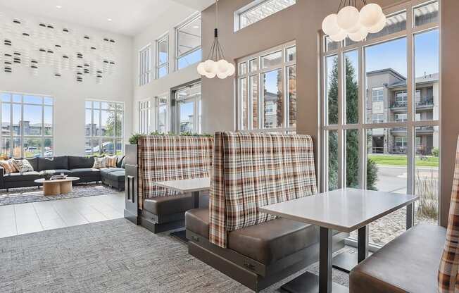 a living room with couches and a table