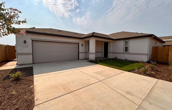 Brand new home located between Tulare and Visalia