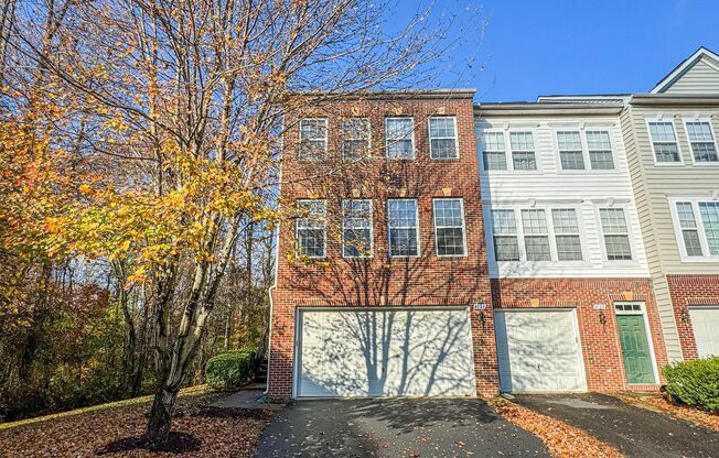 Stunning End-Unit 3 bed 2 Full Bath 2 Half Bath Brick Townhome with Deck & Patio In Vibrant Wescott Ridge