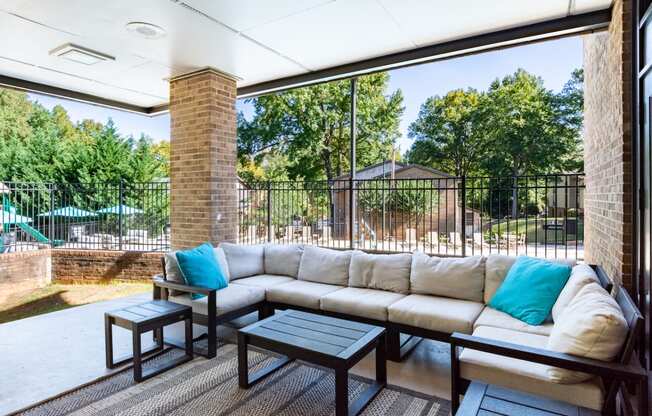 the preserve at ballantyne commons living room with couch and tables