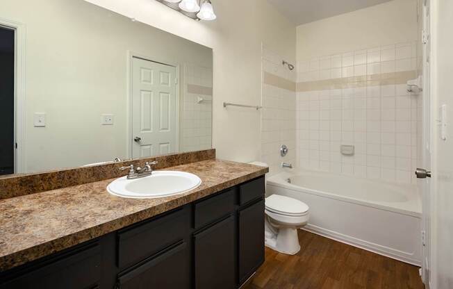 Classic style bathroom: espresso cabinets