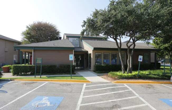 a building with a parking lot in front of it