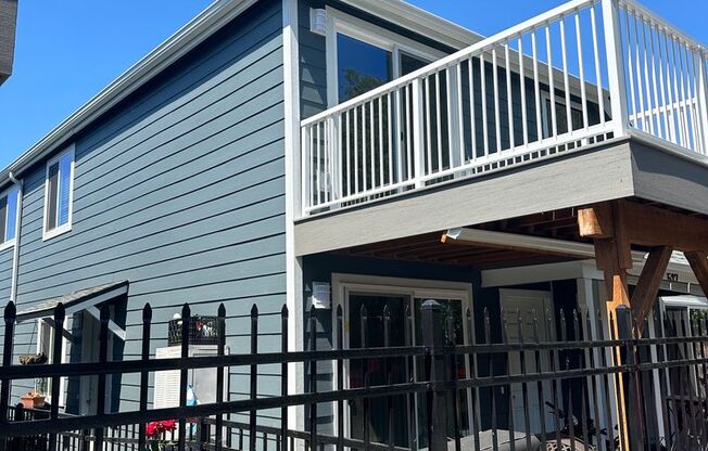 Brand new remodel - top floor 2 bedroom with deck and parking