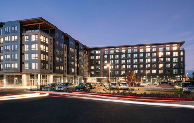 angled exterior of of the hixon apartment building displaying entire L shaped building