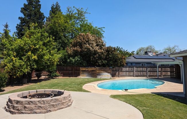 Updated Northwest home with a pool. This home offers a modern kitchen, spacious rooms, living room and family room + nice amenities. Clovis Unified potential, resident to verify.