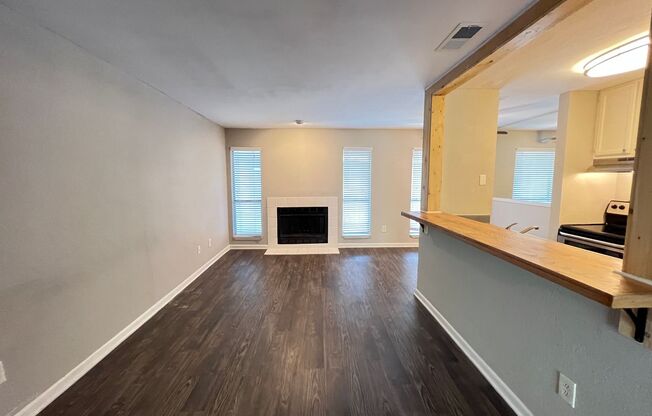 1 bedroom remodeled with a fireplace & balcony in a gated complex with pool!