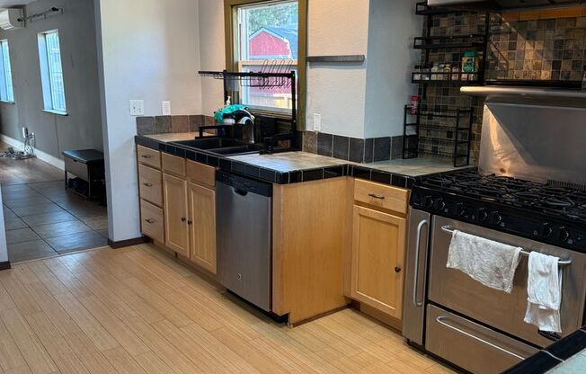 Unique, spacious 4-bdrm/3-bath Craftsman w/ lots of character—Near Alberta District