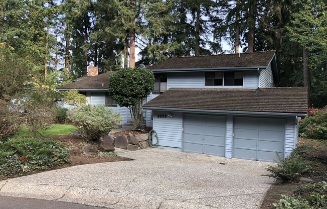 Spacious 4BR 2.75BA Tri-level home in quiet Cedar Lane Estates