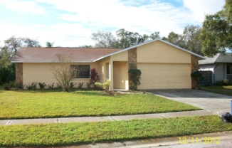 3/2 Spacious Home in Sarasota with 2 Car Garage and Lots of Yard!!