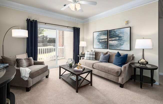 Living Room With Balcony at Abberly Green Apartment Homes, Mooresville, North Carolina