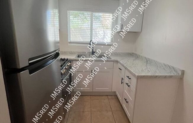 1433 S KENNETH PL