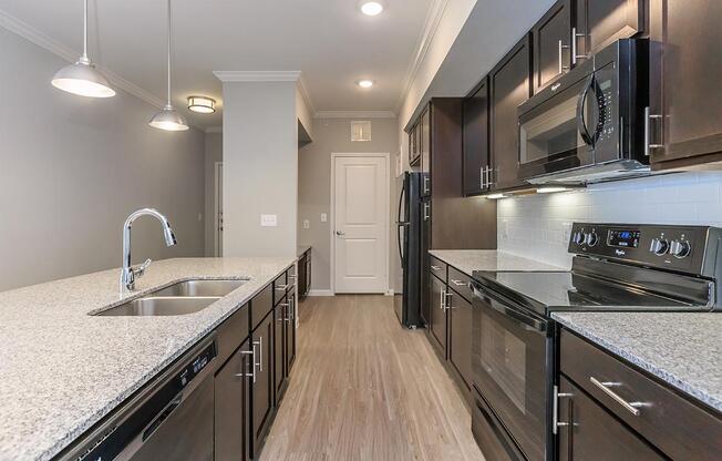 a modern kitchen with stainless steel appliances