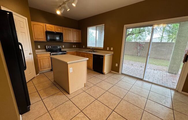 Stylish 3-Bed Home with Loft & Low-Maintenance Backyard in Phoenix