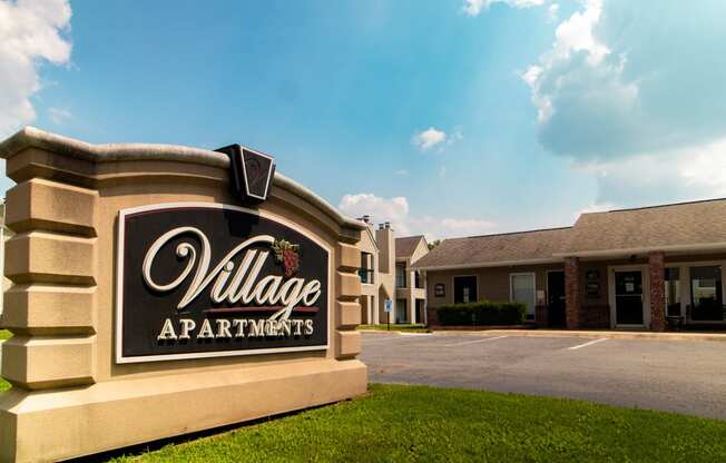 The Village Apartments Sign