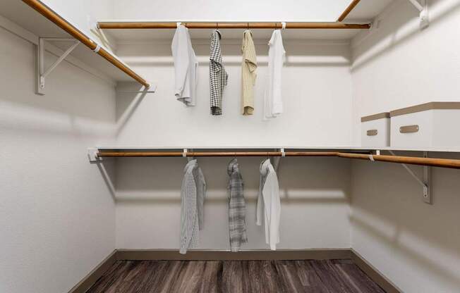 Clothes hanging on a clothesline in a room.