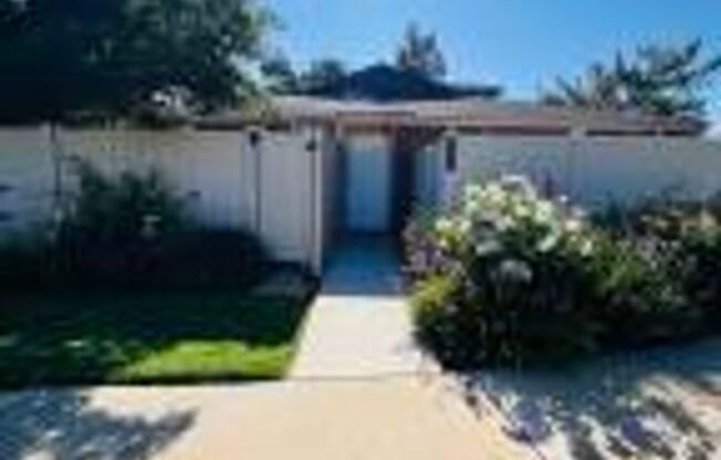 Charming single-story, end-unit condo located in the desirable Whispering Pines community of Annandale