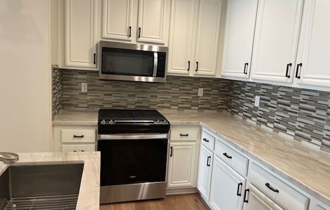 A BEAUTY!  2 STORY 3 BR/2.5 BATH HOUSE IN HIGHLY DESIRABLE GATED COMMUNITY