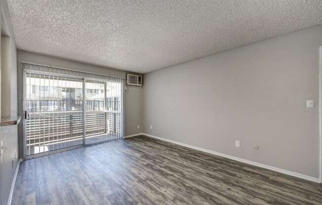 Living Room with access to balcony/deck