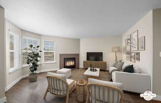 A living room with a fireplace and a couch.