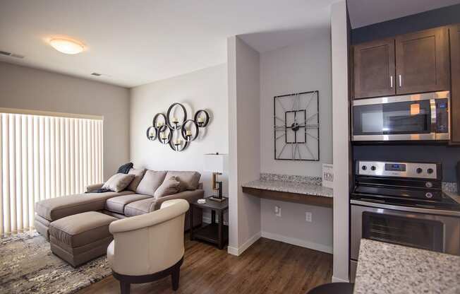 Open Concept Living Room and Kitchen with Built-In Wall Desk