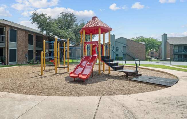 playground at the whispering winds apartments in pearland, tx