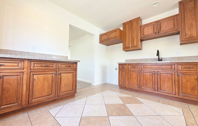 Spacious 4-Bedroom, 2-Bath Gated Home with Garage & Private Backyard