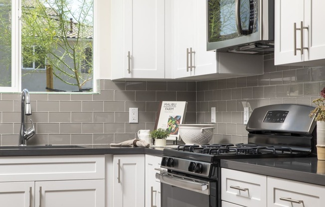 Kitchen cabinets and appliances  at Sorano Apartments, Moreno Valley, CA, 92557
