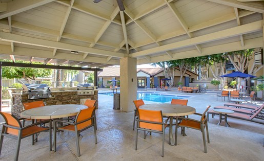 Outside kitchen and dining area by pool