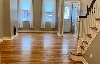 Spacious hardwood 2 bedroom brownstone with huge yard on great tree lined street in Fishtown