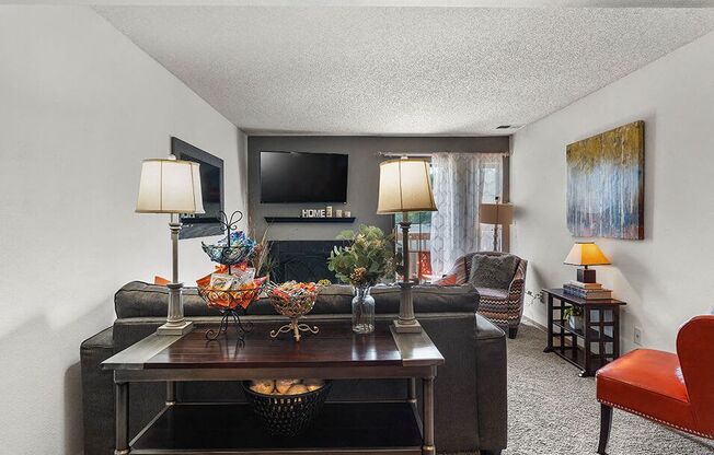 a living room with a couch and a table