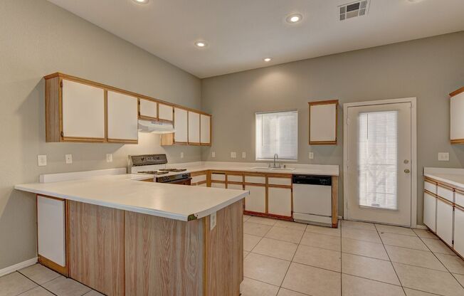 Welcome to this beautifully maintained single-story 4-bedroom 2-bathroom home