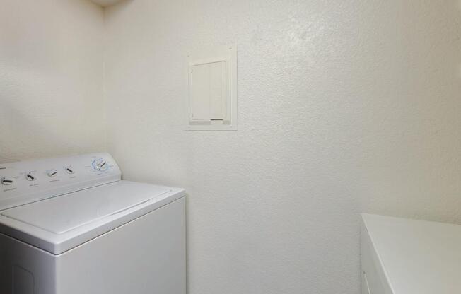 a white refrigerator freezer sitting in a room