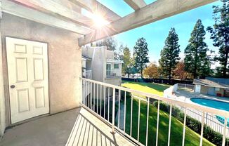 2-Bedroom, 2-Bath Upstairs Condo Unit in Gated Pomona Community, Water/Trash/HOA Included!
