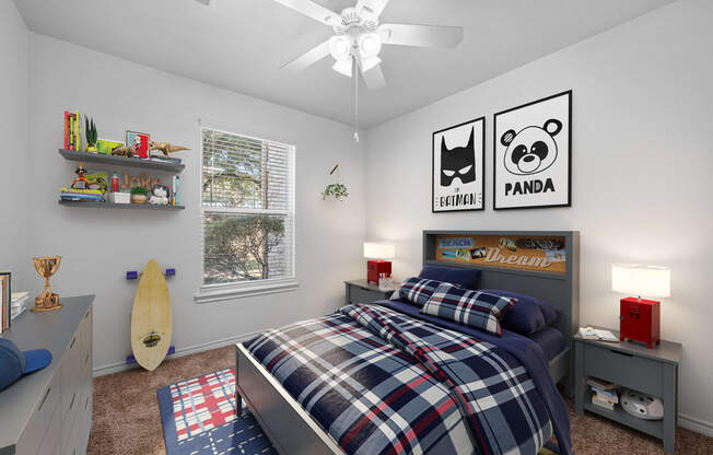 a bedroom with a bed and a surfboard on the wall