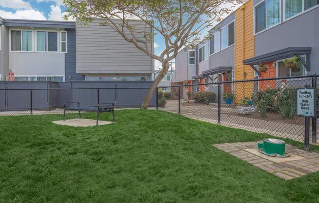 a house with a lawn in front of a building