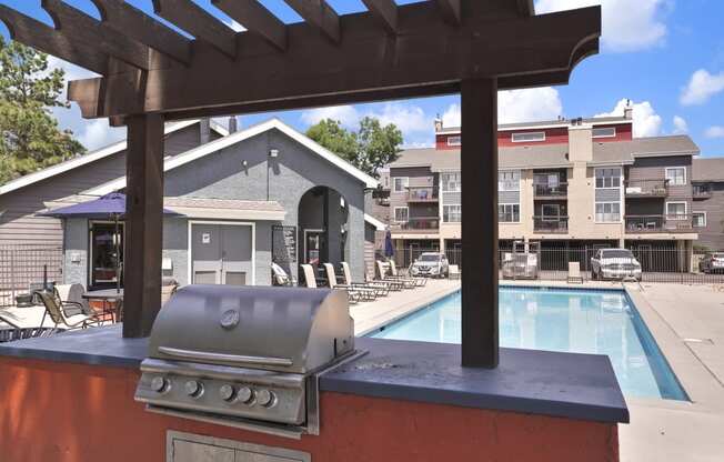 the residences at the crossings apartments pool and clubhouse with a grill