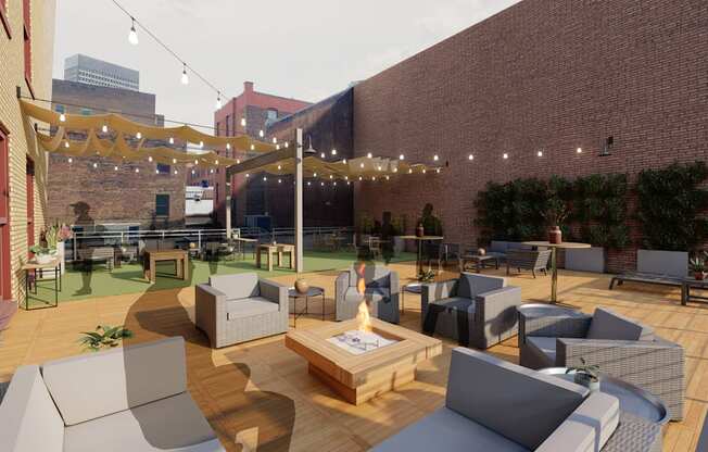 a rooftop patio with chairs and tables and a fire pit