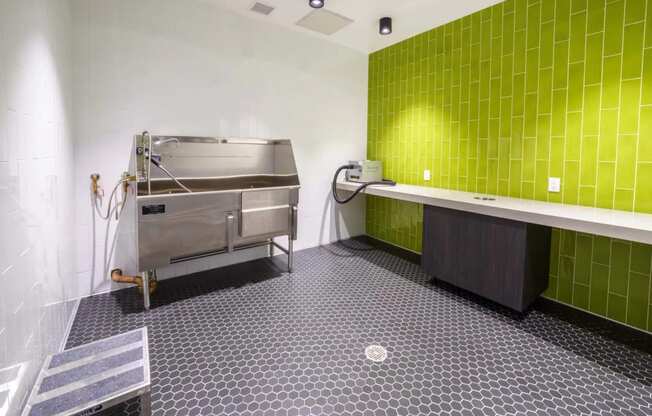 a kitchen with a stove and a counter at NoMa Apartments, Walnut Creek, CA