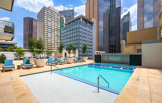 Resort-style swimming pool with sun ledge - Main 3 Downtown