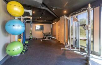 Exercise Equipment in Fitness Center at Waterside at RiverPark Place; Apartments For Rent Louisville, KY