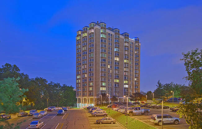 Key Towers exterior and parking lot at night